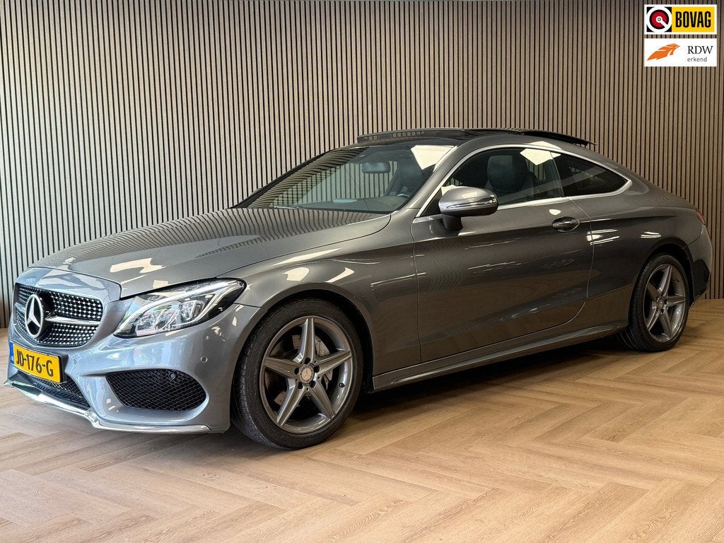 Mercedes-Benz C-klasse Coupé C180 Ambition AUT AMG PANORAMA, Auto's, Automaat, Achterwielaandrijving, Met garantie (alle), 4 stoelen
