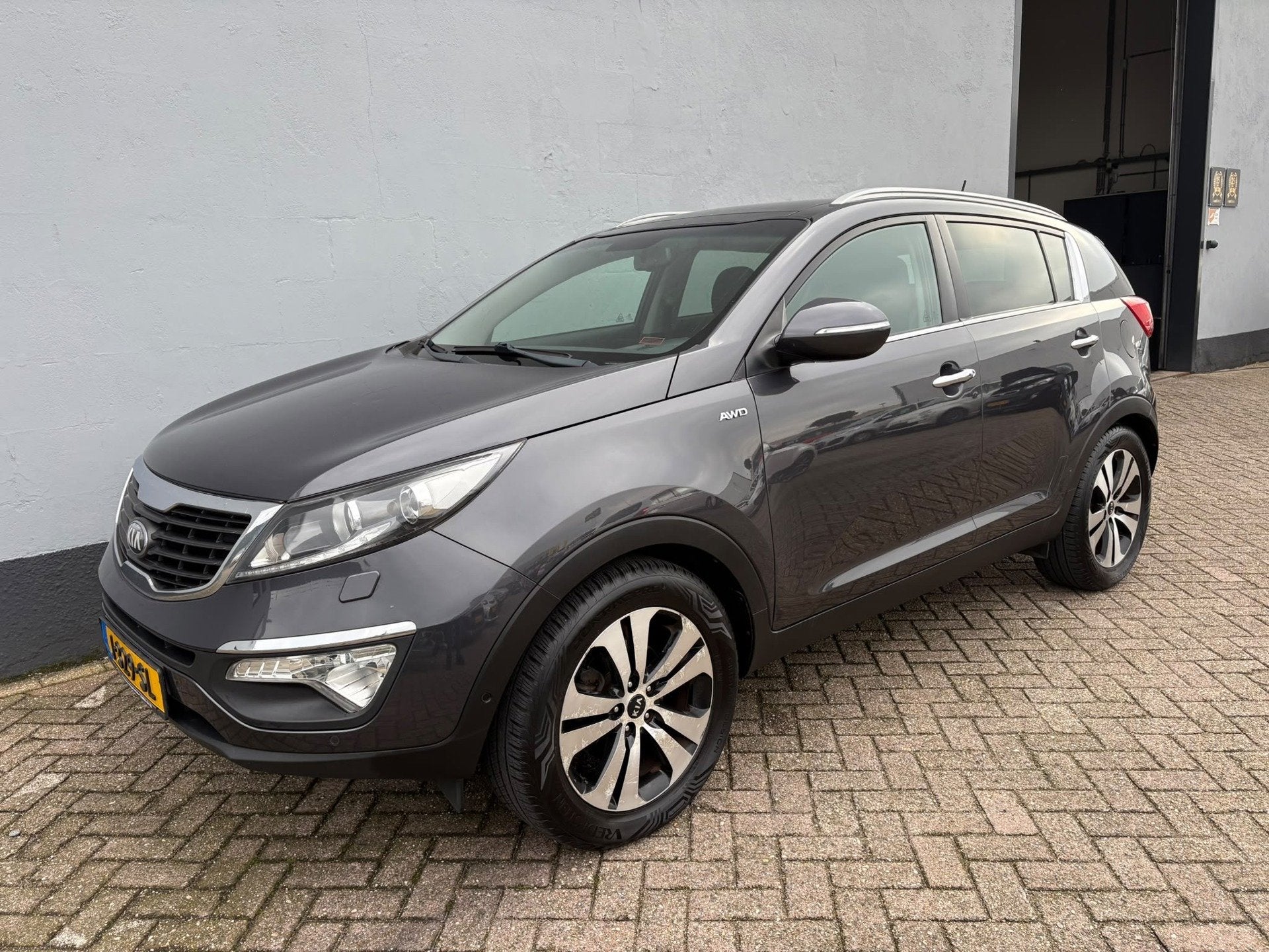 Kia Sportage 2.0 Super Pack AWD Automaat - Panorama, Auto's, Automaat, Gebruikt, 4 cilinders, Verwarmde buitenspiegels