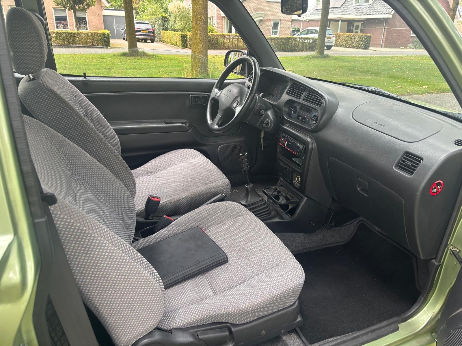 Daihatsu Cuore 1.0-12V XTi (bj 1999), foto 9