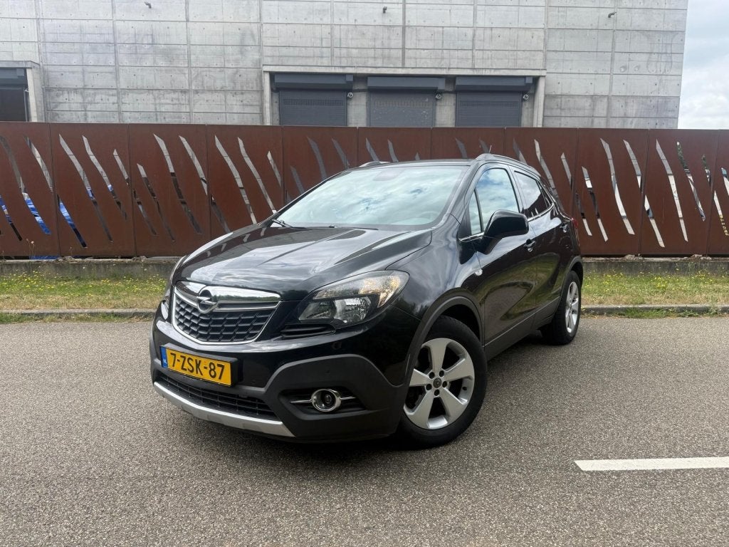 Opel Mokka 1.4 Turbo 140PK Start/Stop Cosmo, Auto's, Voorwielaandrijving, Gebruikt, Euro 6, 4 cilinders