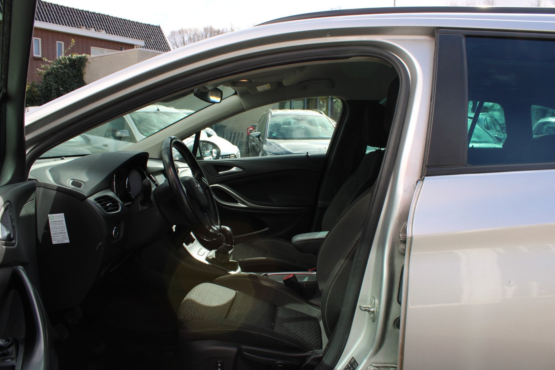 Opel Astra Sports Tourer 1.2 Business Edition (bj 2021), Auto's, Voorwielaandrijving, Dealer onderhouden, Stof, Gebruikt