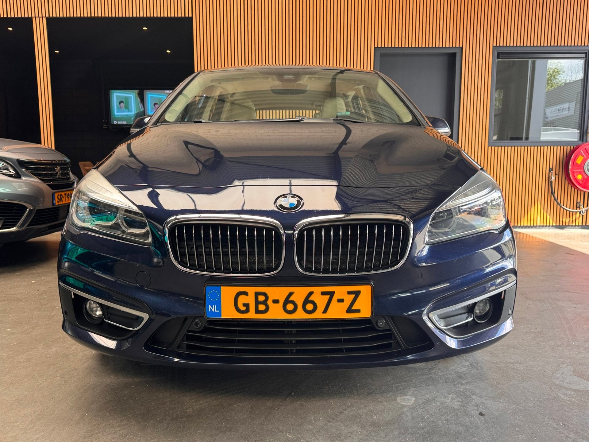 BMW 2-serie Active Tourer 218i Luxury Automaat ACC|HUD|Stoel, Auto's, BMW, Dealer onderhouden, 136 pk, Gebruikt, Blauw