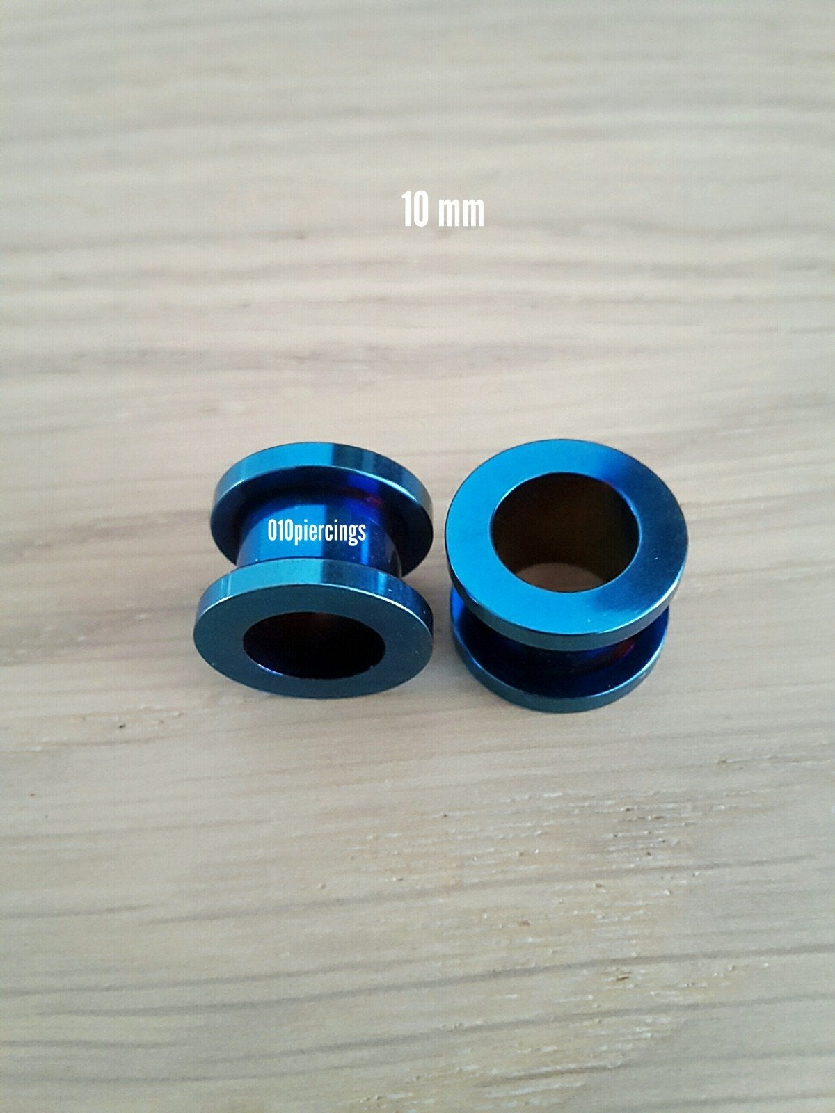 Nieuwe tunnels, pluggen. Blauw. Staal., Sieraden, Tassen en Uiterlijk, Piercings, Ophalen of Verzenden, Zo goed als nieuw, Staal