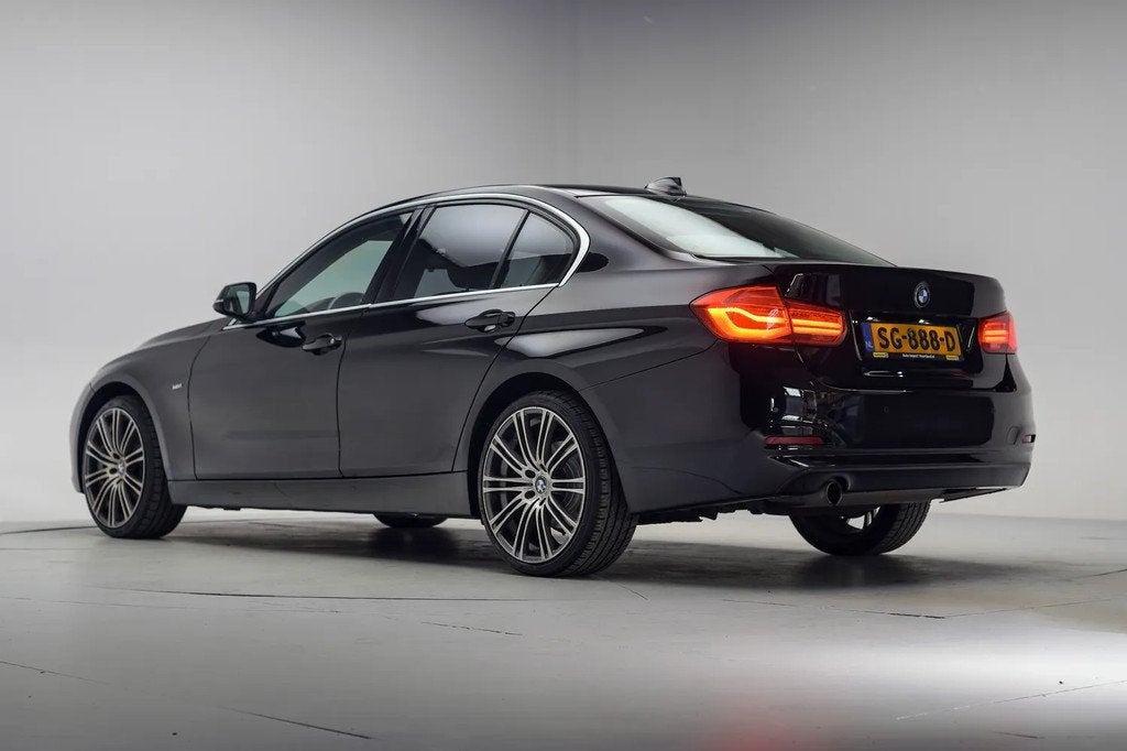 BMW 3 Serie 318i Luxury Line Executive [ Leder Navi prof. LE, Auto's, BMW, Automaat, 136 pk, Gebruikt, Zwart