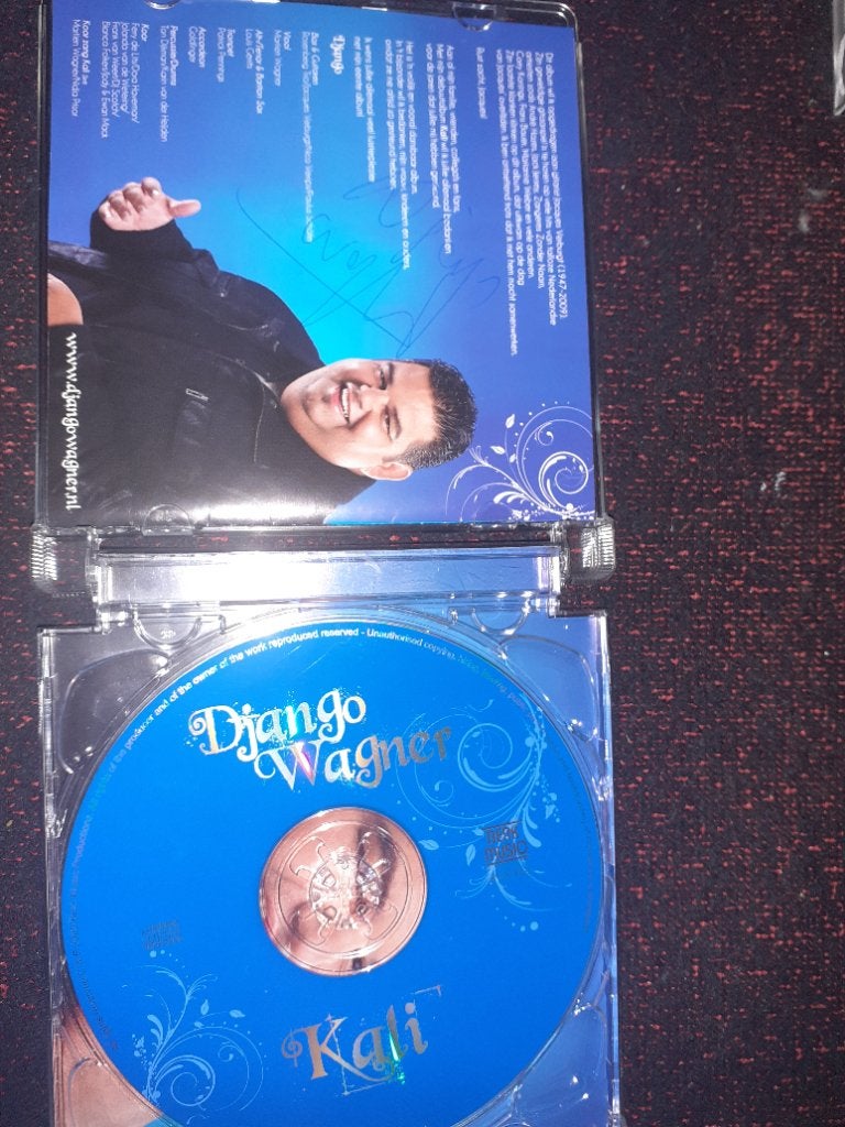 Django wagner gesigneerd, Ophalen, Zo goed als nieuw, Levenslied of Smartlap