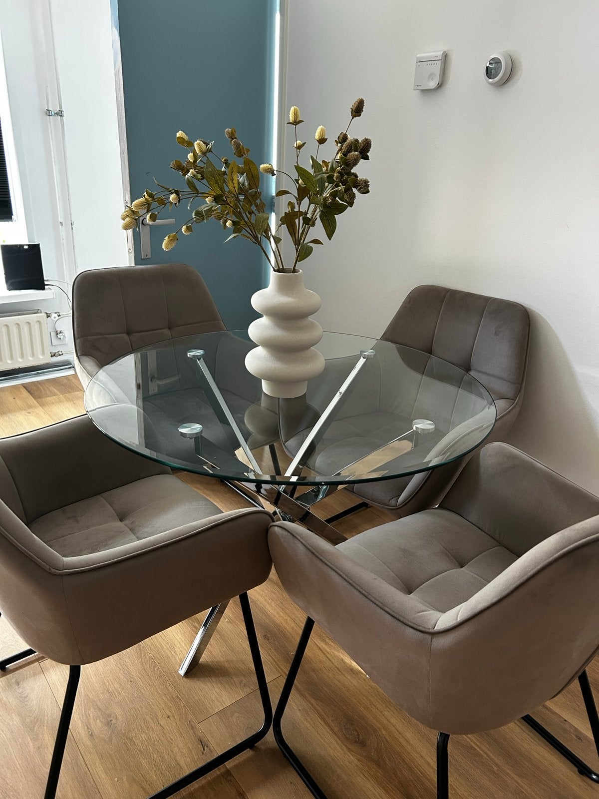 Glazen eettafel met chromen onderstel, Huis en Inrichting, Tafels | Eettafels, 100 tot 150 cm, Rond, Ophalen of Verzenden, Vier personen