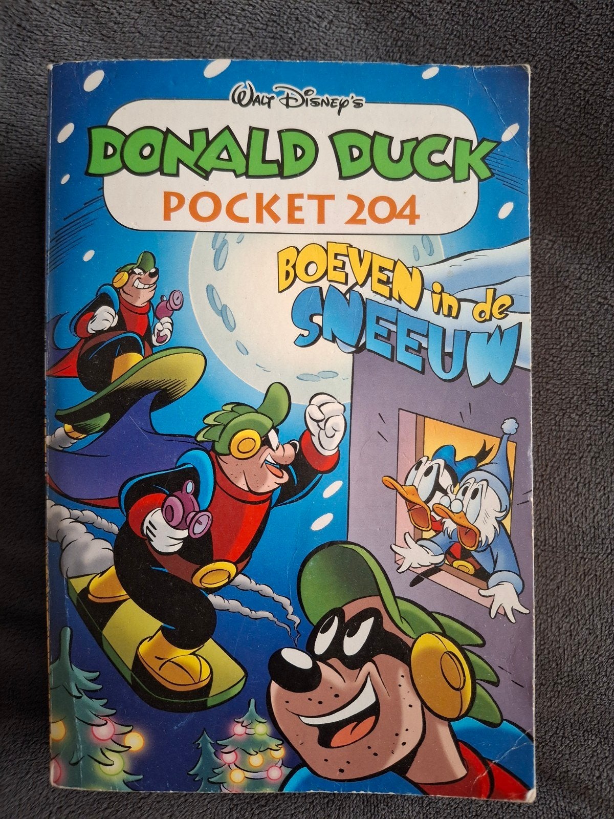 Donald Duck pocket 204 - Boeven in de sneeuw, Gelezen, Ophalen of Verzenden, Walt Disney, Eén stripboek