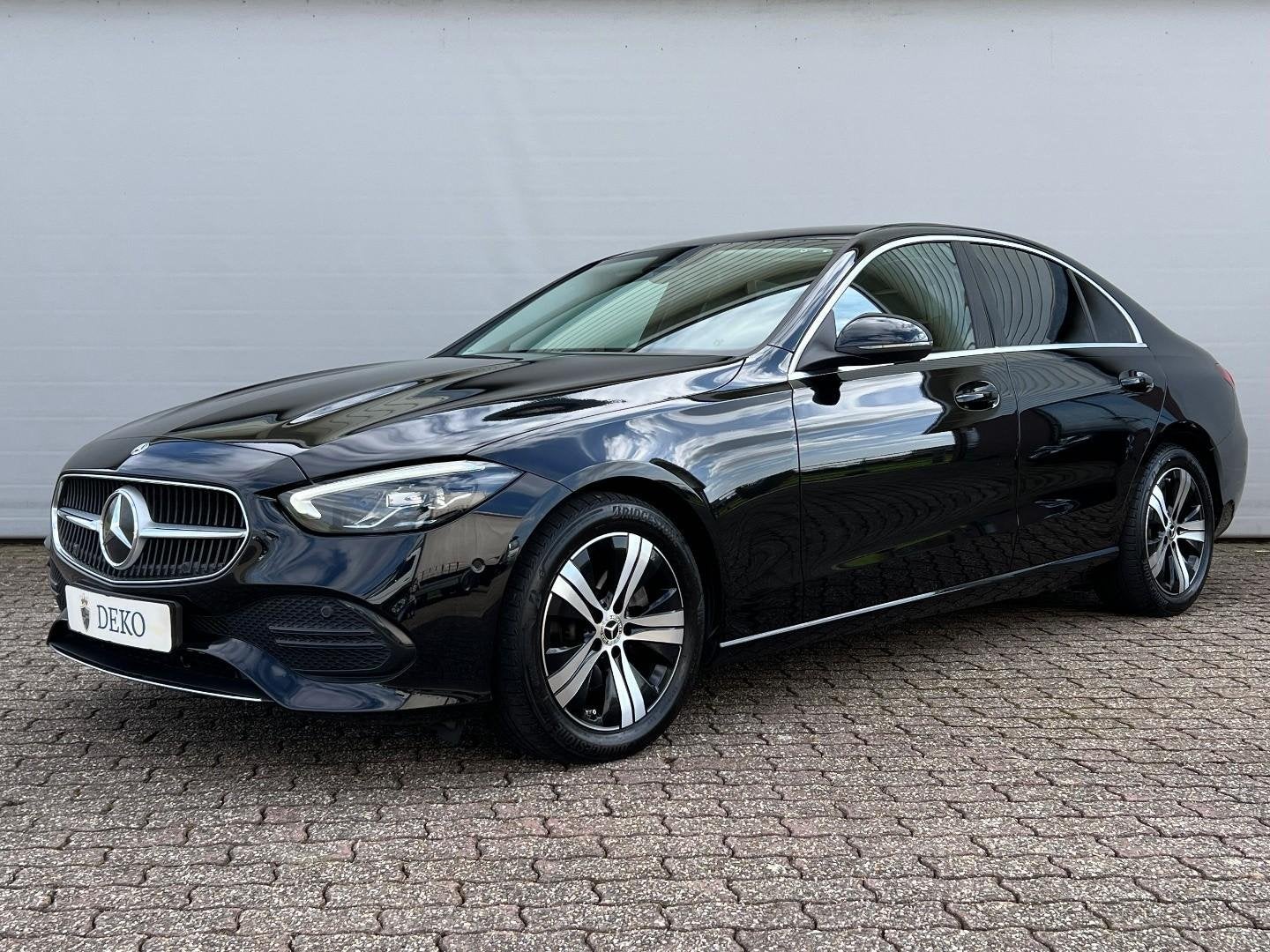 Mercedes-Benz C-klasse 180 Sedan | Luxury line | Trekhaak |, Automaat, Dealer onderhouden, Zwart, 4 cilinders
