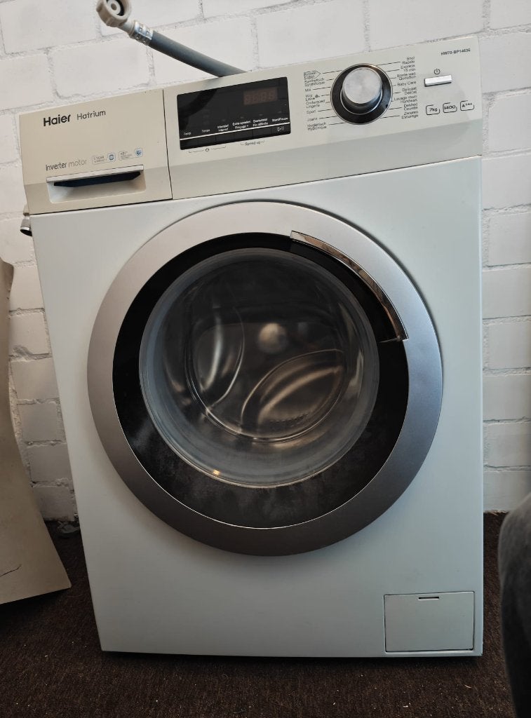 Wasmachine / Haier HW70-BP14636 / 7 kg / 1400 toeren, Ophalen, Gebruikt, Voorlader, 85 tot 90 cm