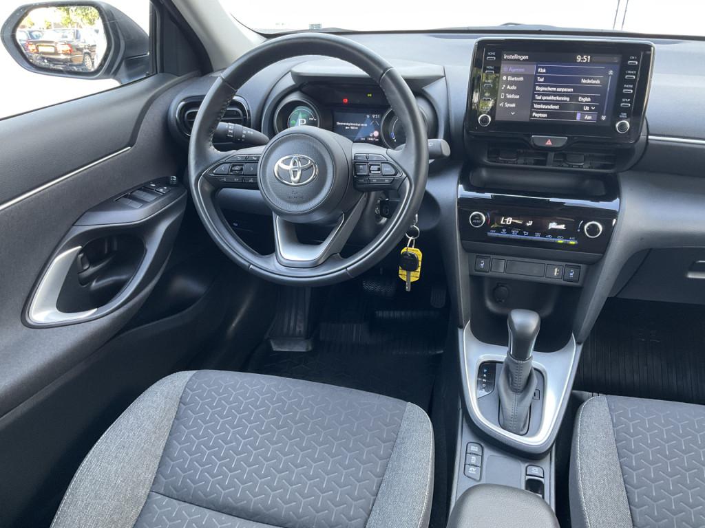 Toyota Yaris Cross 1.5 Hybrid Dynamic Hoge zit Navi Camera S, Auto's, Stof, Gebruikt, 1490 cc, Bedrijf
