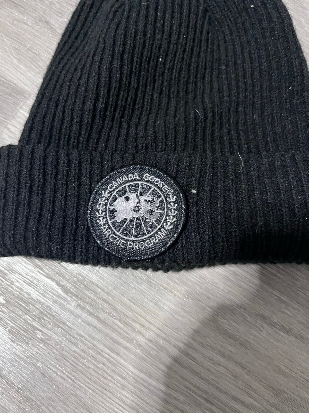Canada Goose Muts Zwart, Ophalen of Verzenden, Zo goed als nieuw, Maat 38/40 (M), Muts