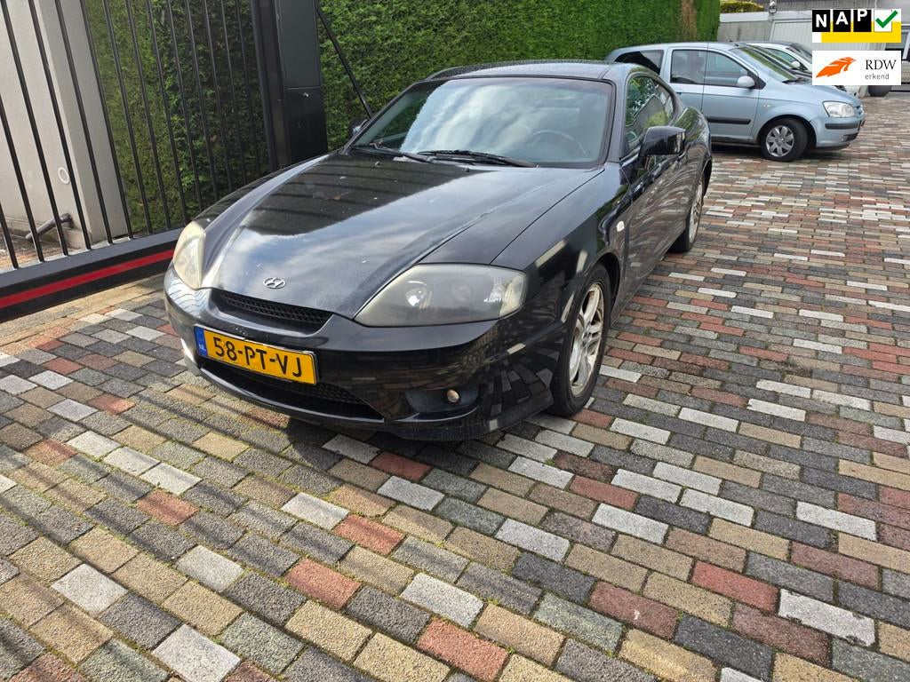 Hyundai Coupé 2.0i-16V Dynamic 2004 Clima, 4 stoelen, Zwart, Bedrijf, Handgeschakeld