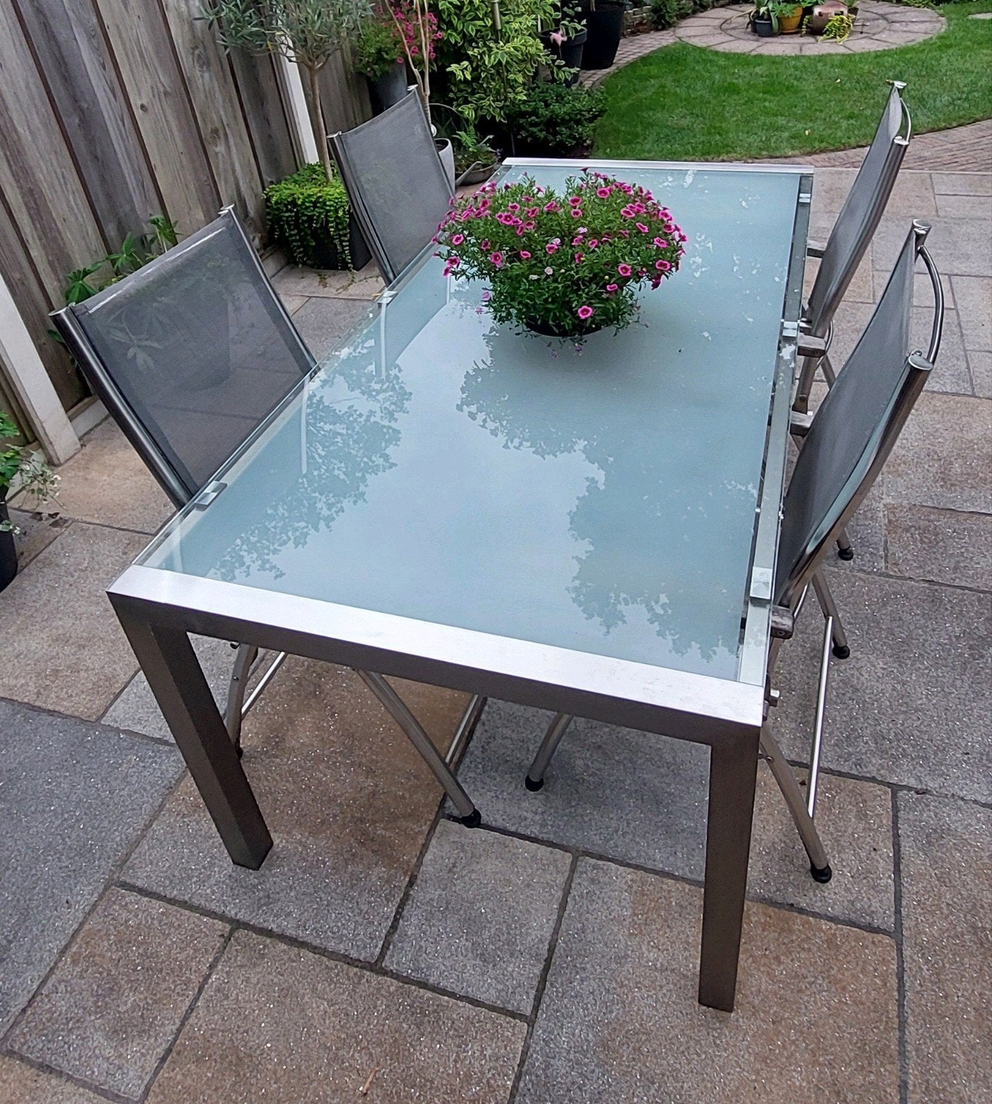 RVS tuinset met glazen tafel (100x200) en 4 verstelbare stoe, Ophalen, 4 zitplaatsen, Gebruikt, Rvs