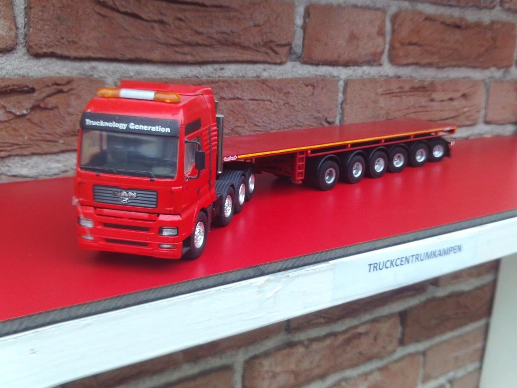 Conrad  Man  8 x 4  met  Ballasttrailer., Hobby en Vrije tijd, Modelauto's | 1:50, Ophalen of Verzenden, Zo goed als nieuw, Bus of Vrachtwagen