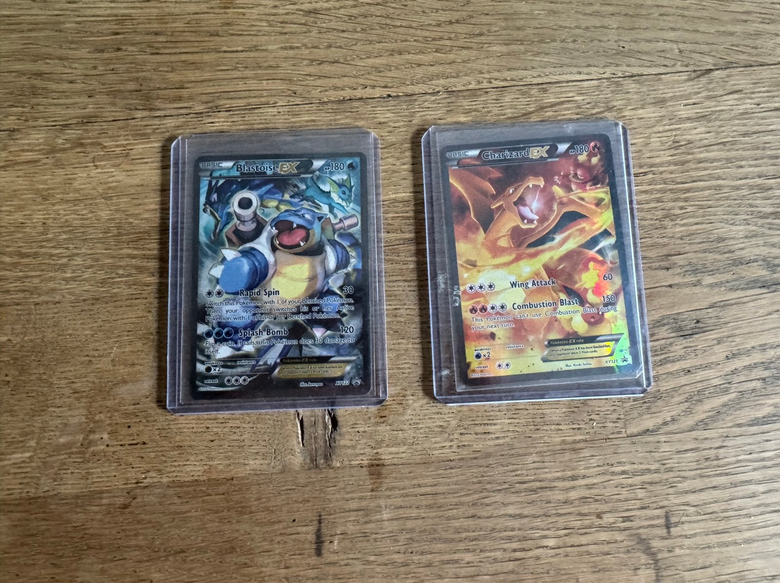 Pokémon kaarten: Blastoise EX en Charizard EX, Ophalen of Verzenden, Zo goed als nieuw, Meerdere kaarten