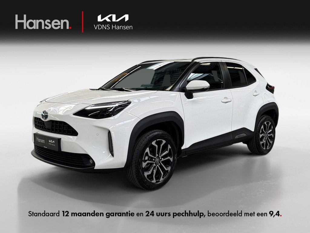 Toyota Yaris Cross 1.5 Hybrid 130 Dynamic I Direct leverbaar, Auto's, Toyota, Gebruikt, Wit, 1490 cc, Bedrijf