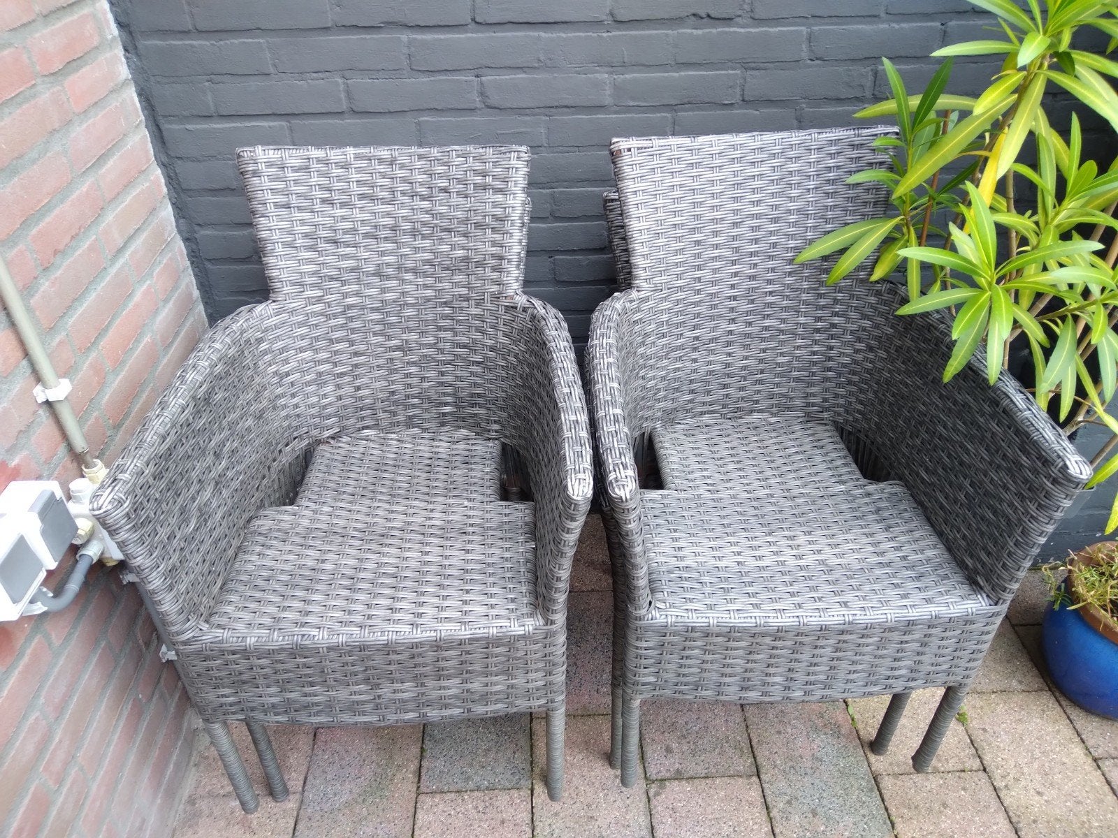 4 x Wicker tuinstoelen - Grijs- Stapelbaar., Ophalen, Gebruikt, Wicker, Stapelbaar