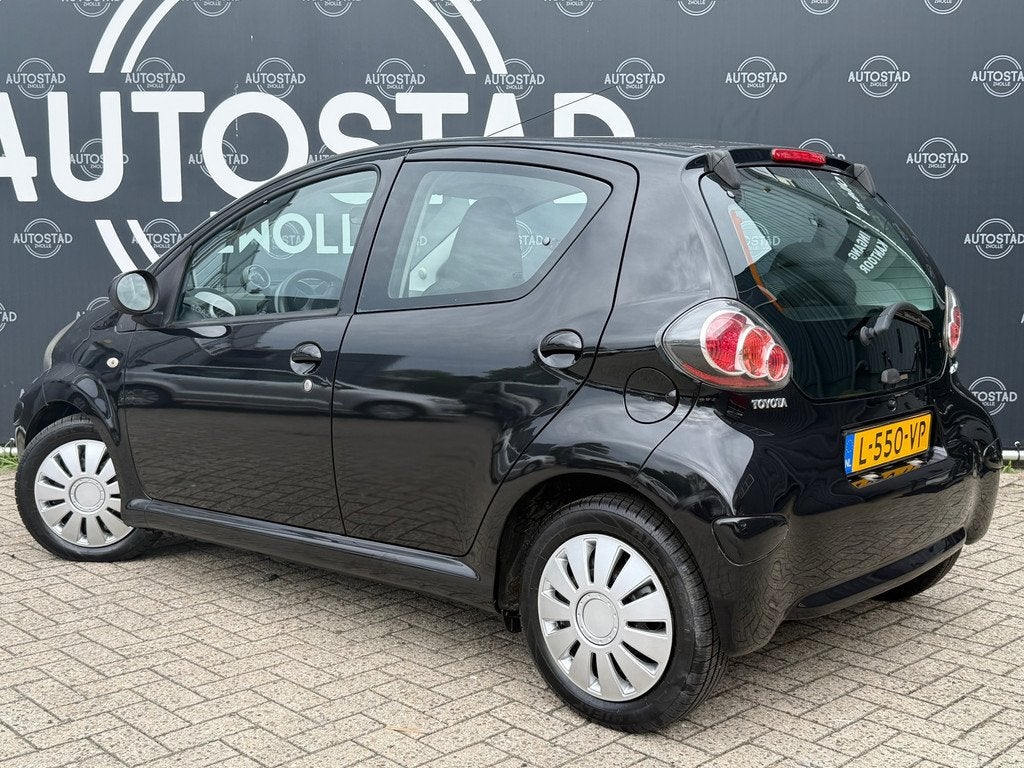 Toyota Aygo 1.0-12V Comfort Automaat / Airco / Navi / APK /, Auto's, Stof, Zwart, Bedrijf, Nieuw