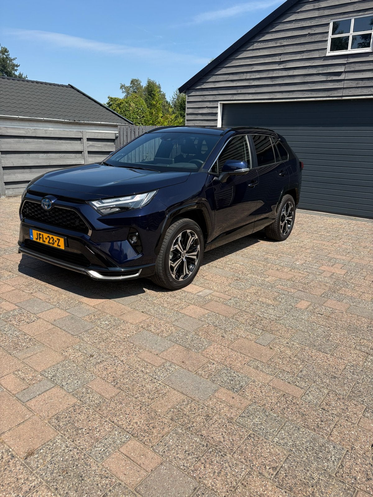 Toyota Rav4 2.5 Plug-in Hybrid 306pk CVT AWD 2025 Blauw, Auto's, Toyota, Automaat, 4 cilinders, Blauw, Leder en Stof