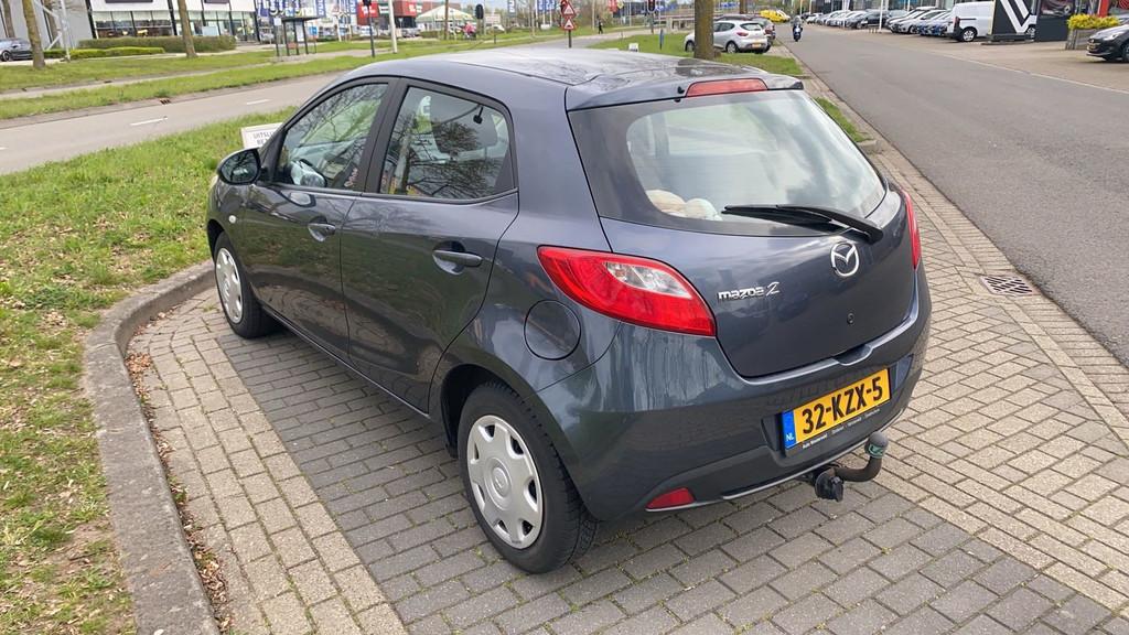 Mazda 2 1.3 TS 75pk 5-deurs Airco Trekhaak Historie Degelijk, Voorwielaandrijving, Stof, Gebruikt, 31 €/maand