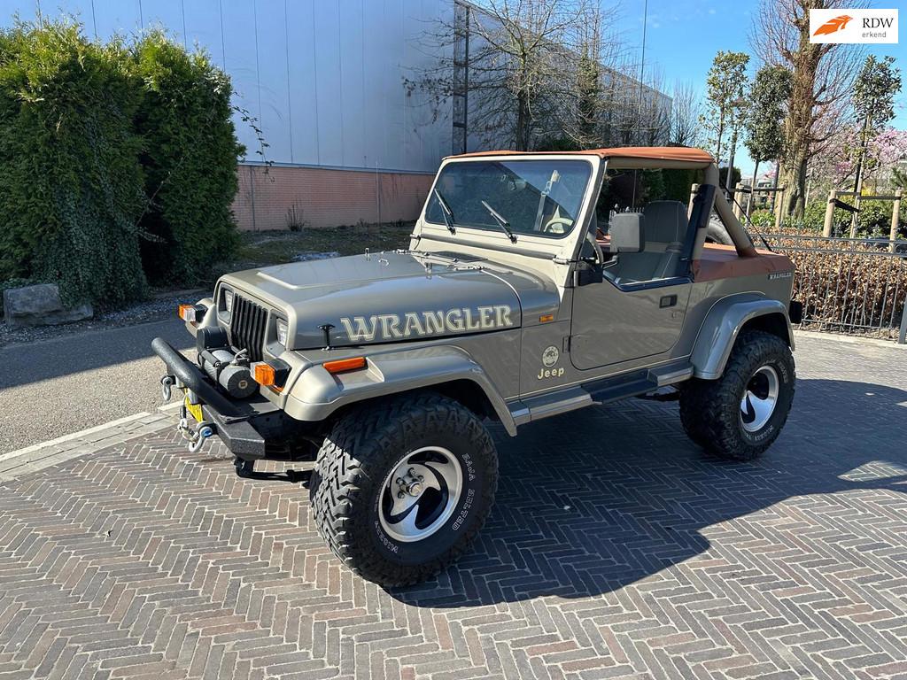 Jeep Wrangler 4.0i Sahara 6 cilinder YJ Cabrio met softtop, Auto's, Bestelauto's, Jeep, 657 kg, Stof, Gebruikt