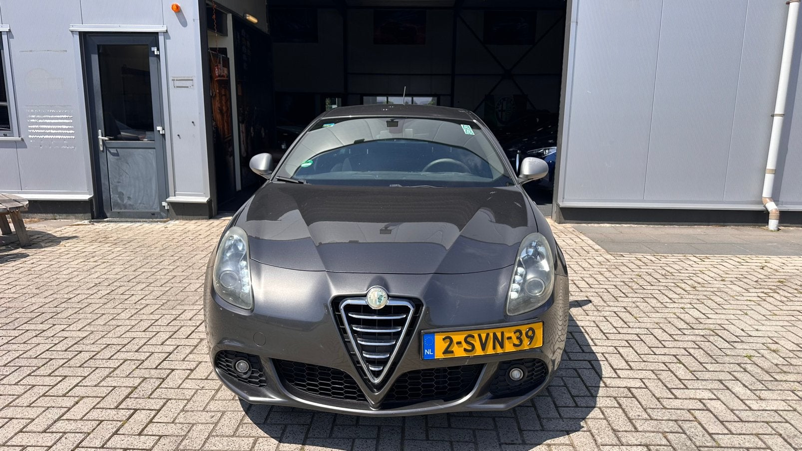 Alfa Romeo Giulietta 1.4 Turbo 77KW/105PK 2013 Grijs, Auto's, Voorwielaandrijving, Stof, Zwart, 4 cilinders