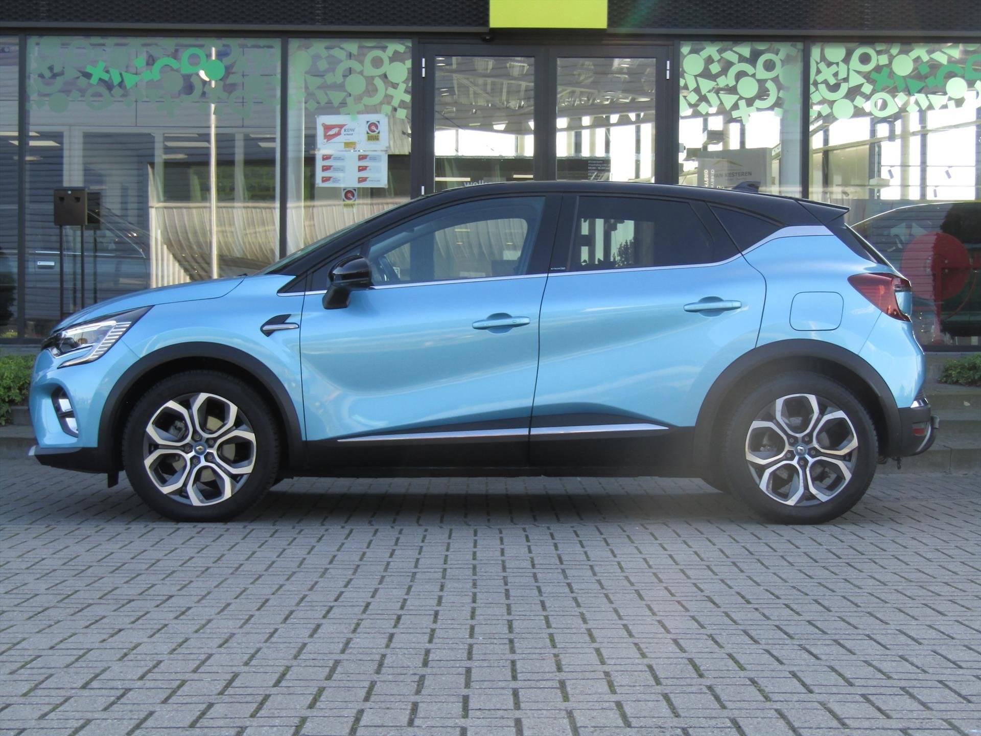 RENAULT Captur E-Tech Plug-In Hybrid 160pk Intens Trekhaak /, Auto's, Gebruikt, 4 cilinders, Blauw, Leder en Stof