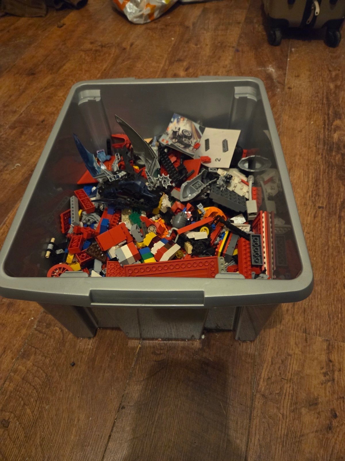Bak met lego, Ophalen, Zo goed als nieuw