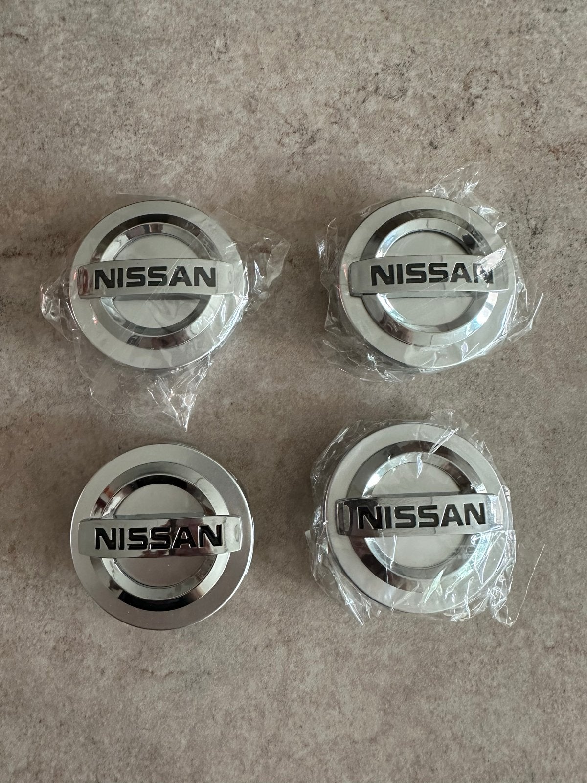 Nieuwe Nissan Naafdoppen - Set van 4, Auto diversen, Ophalen of Verzenden, Nieuw