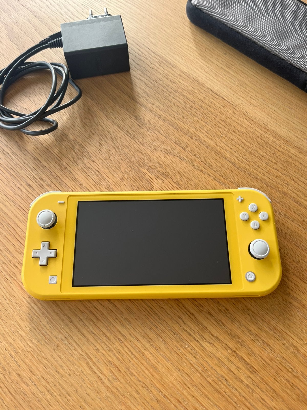 Nintendo Switch Lite, Spelcomputers en Games, Ophalen, Geel, Zo goed als nieuw