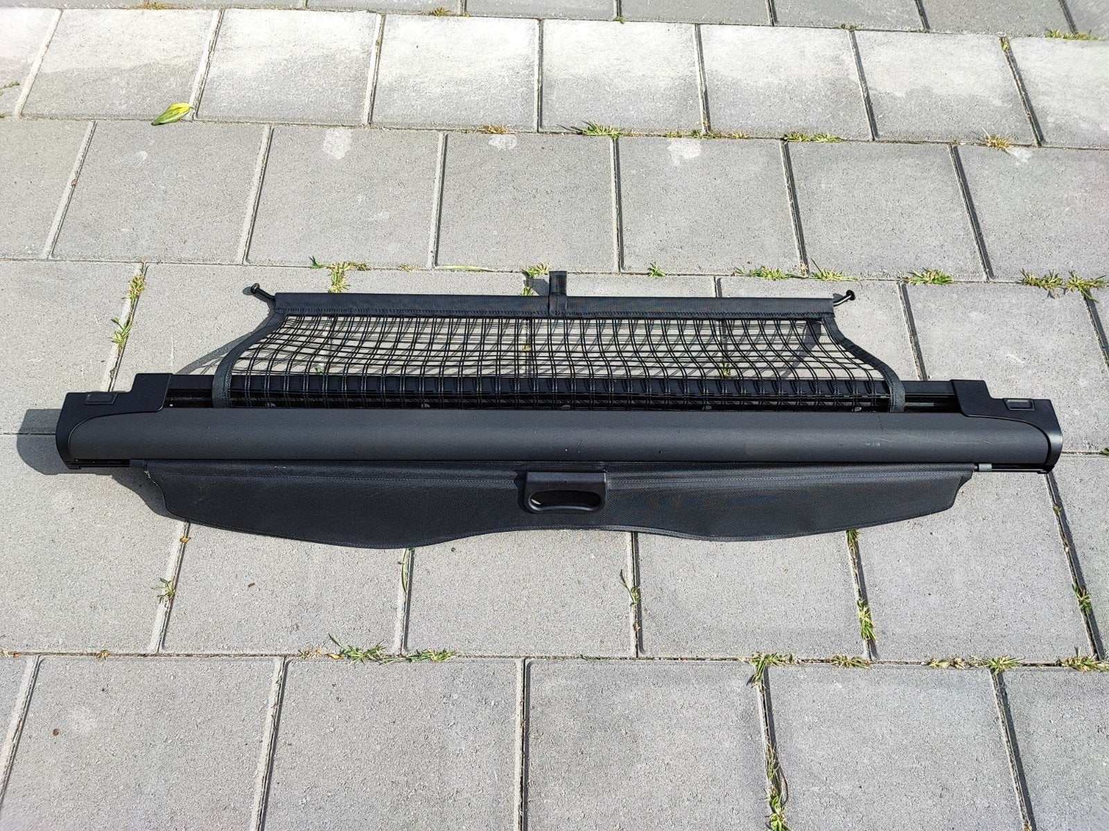 Bagagerolhoes met hondenrek voor auto, Ophalen
