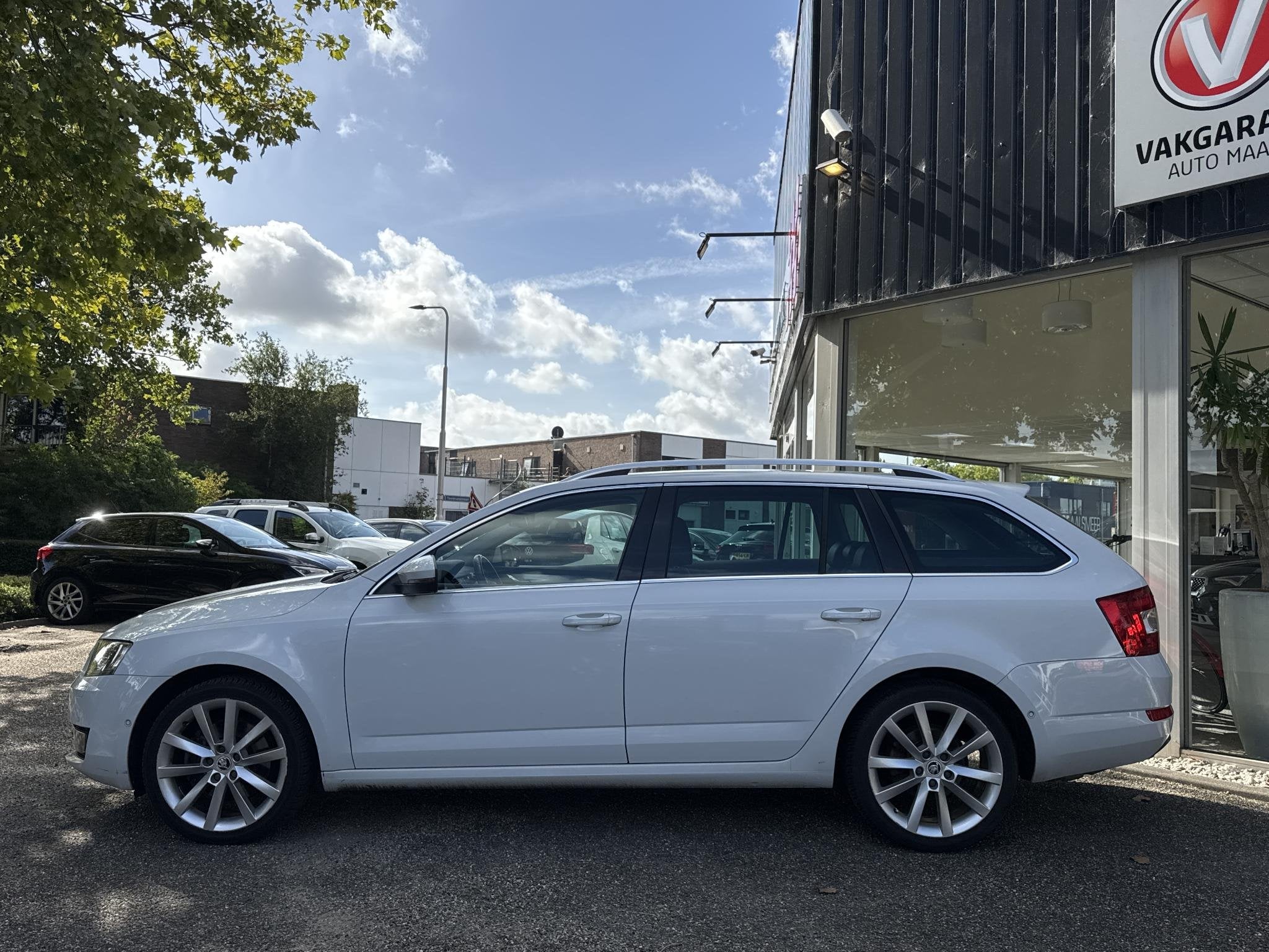 Skoda Octavia Combi 1.8 TSI Greentech Style Business, Auto's, Gebruikt, 4 cilinders, Wit, Origineel Nederlands