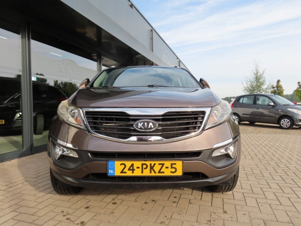 Kia SPORTAGE 2.0 X-ECUTIVE Plus Ecc Cruise Pano Trekhaak 201, Auto's, 13 km/l, Gebruikt, 4 cilinders, Bruin