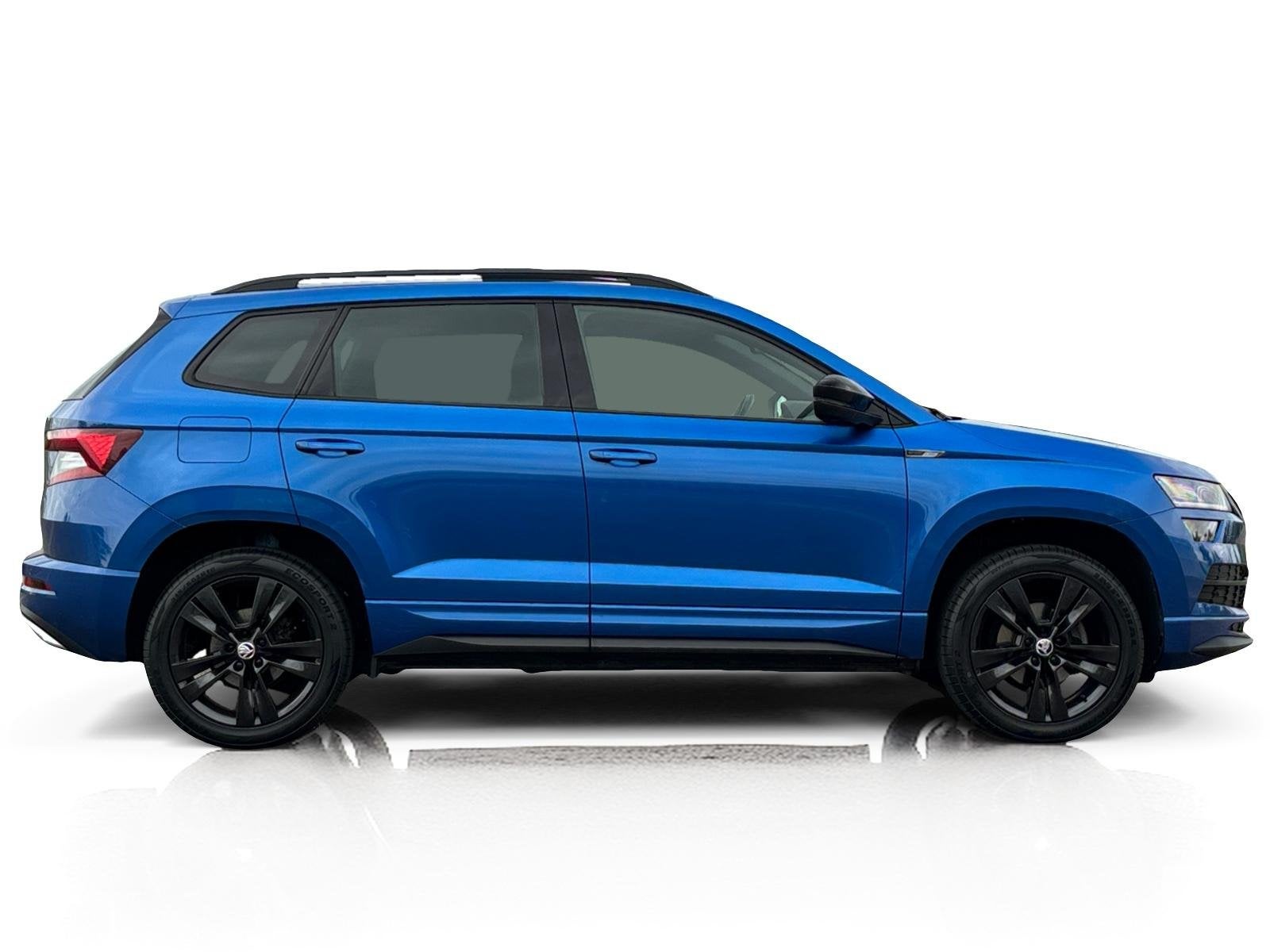 Skoda Karoq 1.5 TSI DSG7 Sportline ✅ Pano ✅ LED ✅ ACC, Stof, 4 cilinders, 150 pk, Blauw