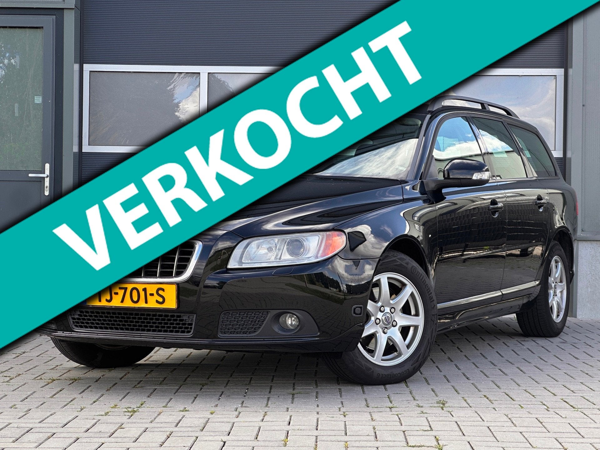 Volvo V70 2.0 Momentum Xenon Trekhaak Climatecontrol, Auto's, Volvo, Voorwielaandrijving, Gebruikt, Zwart, Leder en Stof