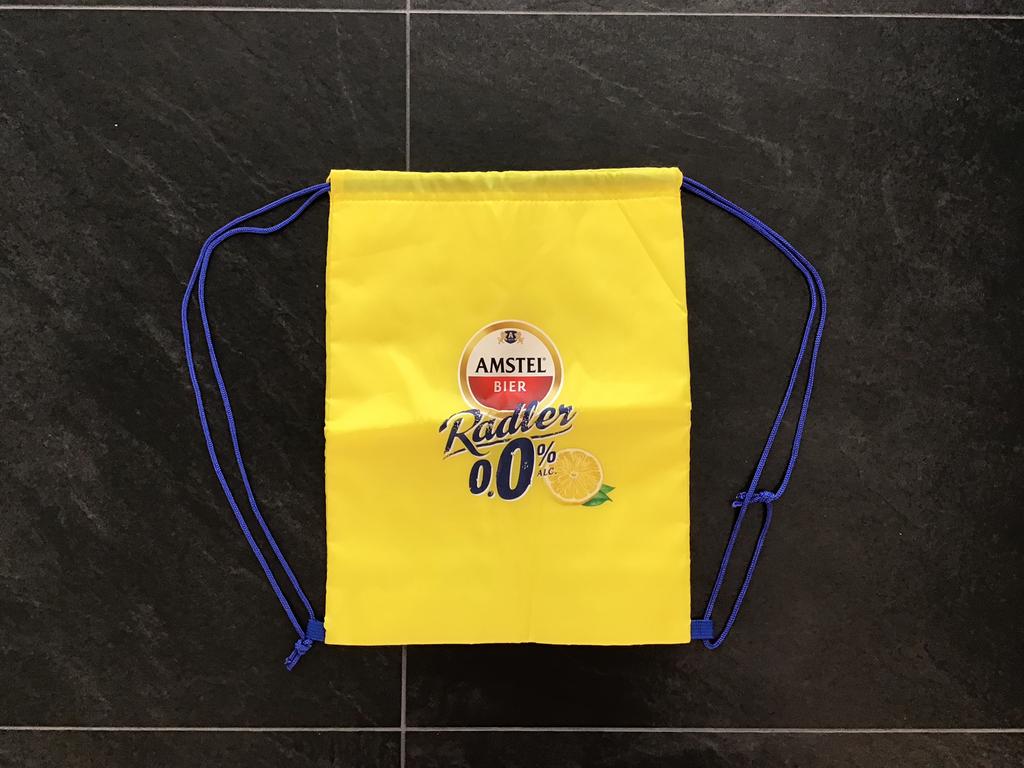 Gele koeltas / rugtas / tas. Van Amstel Bier. Nieuw., Verzenden, Nieuw, Koeltas, Koelelement