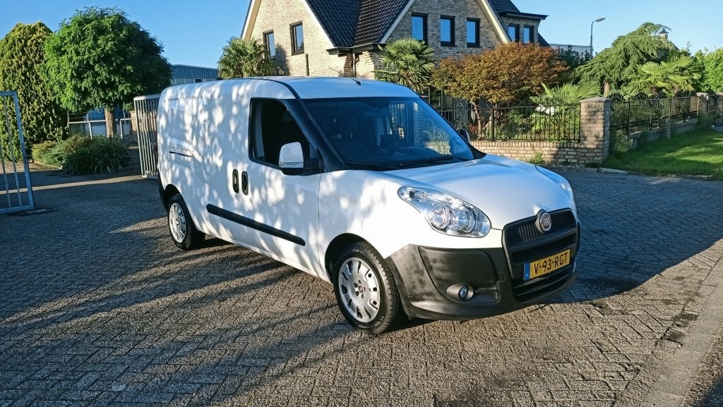 Fiat Doblò Cargo 1.4 SX Maxi (bj 2010), Auto's, Voorwielaandrijving, Gebruikt, Wit, 14 km/l