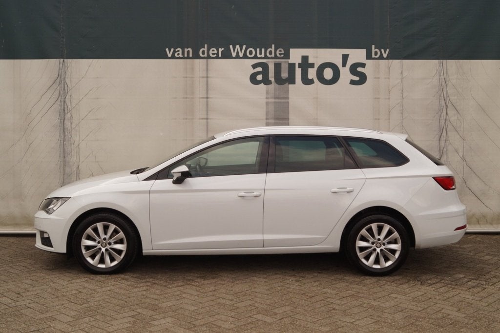 SEAT Leon ST 1.6 TDI 115pk Style -NAVI-ECC-PDC- (bj 2019), Auto's, Seat, Voorwielaandrijving, Stof, Gebruikt, Euro 6