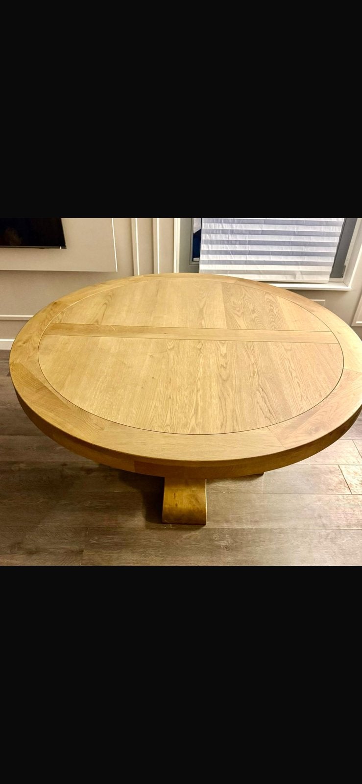 Ronde eikenhouten eettafel Ø130 cm – zo goed als nieuw