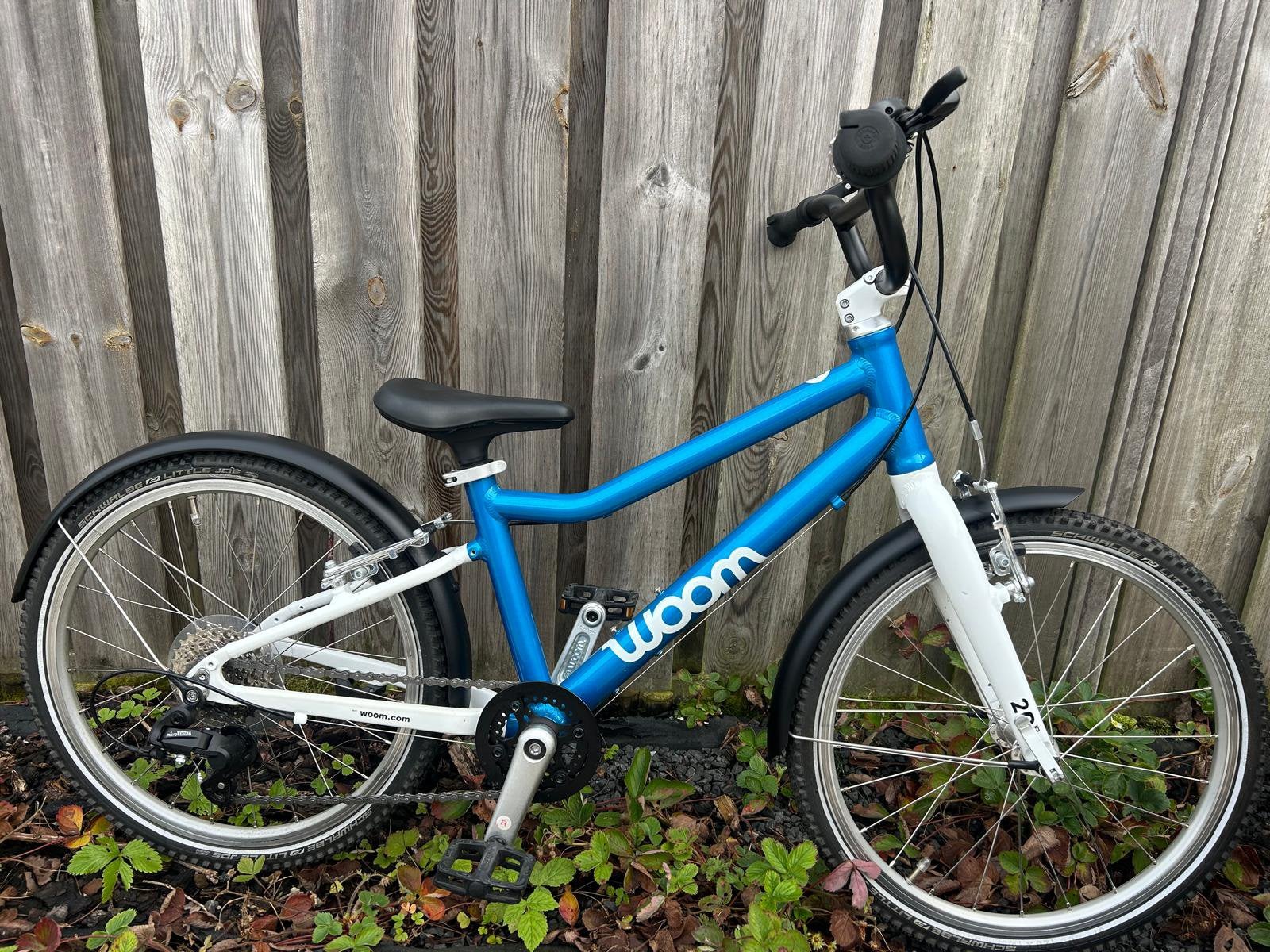 Woom 4 blauw nieuw, Ophalen, Zo goed als nieuw
