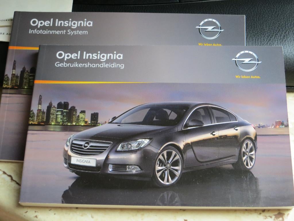 Instructieboek Opel Insignia 2010 + handleiding audio/navi, Ophalen of Verzenden
