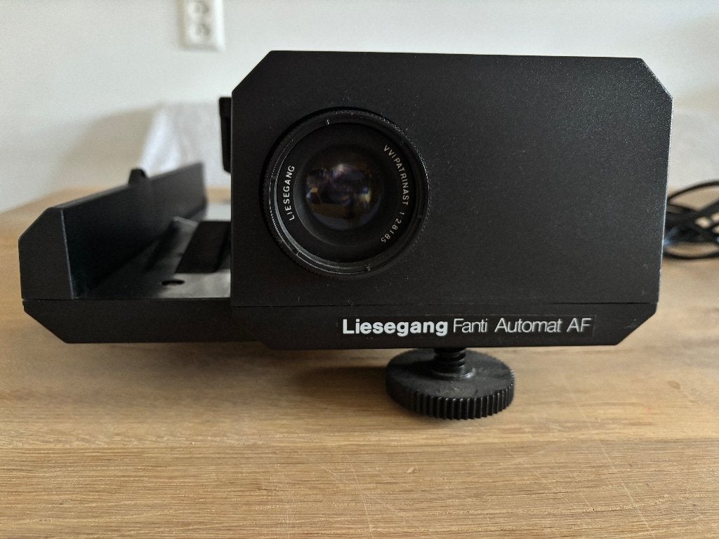Liesegang Automat AF diaprojector, Ophalen
