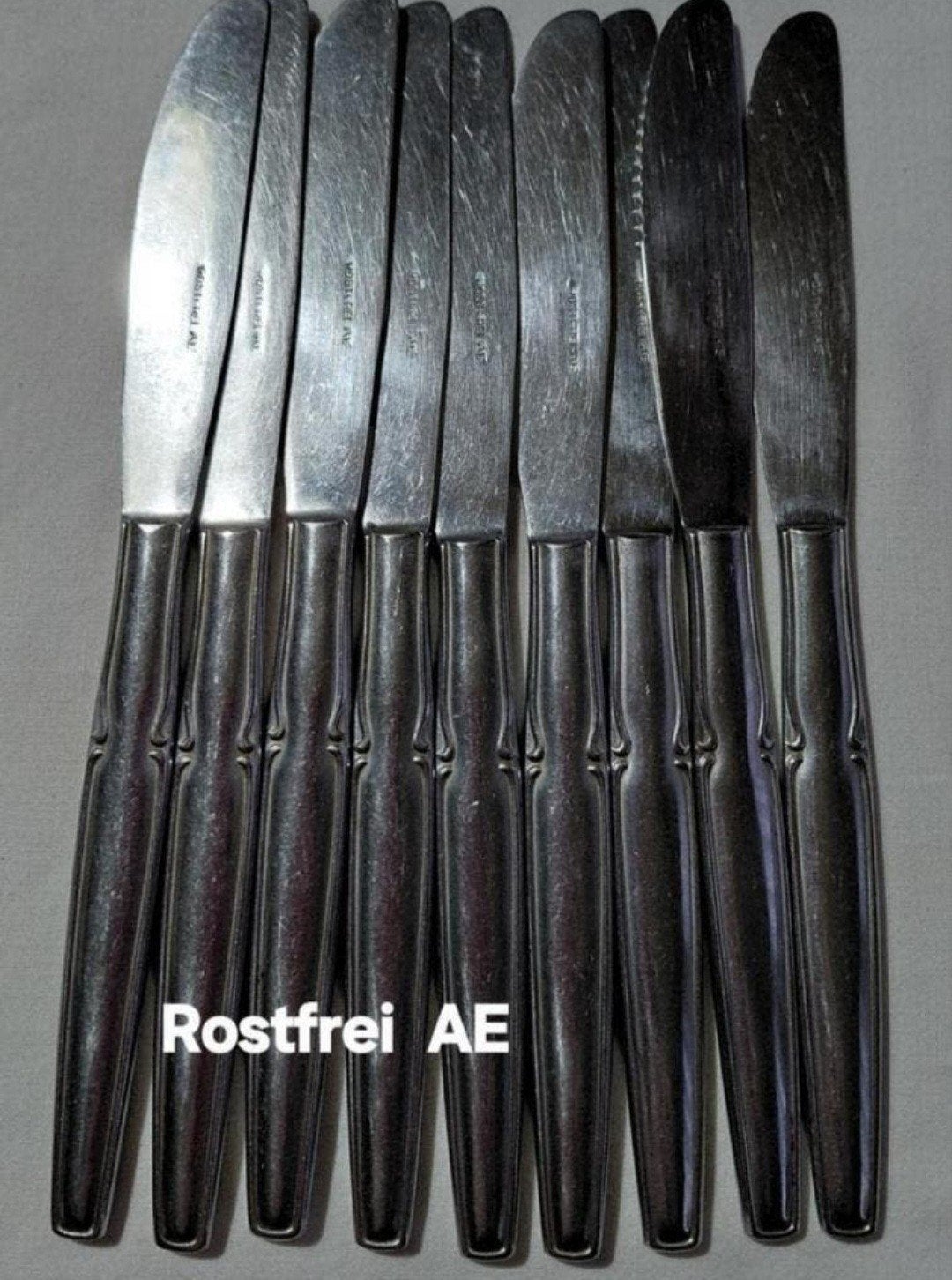 Set 10 Duitse AE messen bewerkte handvatten, Antiek en Kunst, Antiek | Bestek, Ophalen of Verzenden