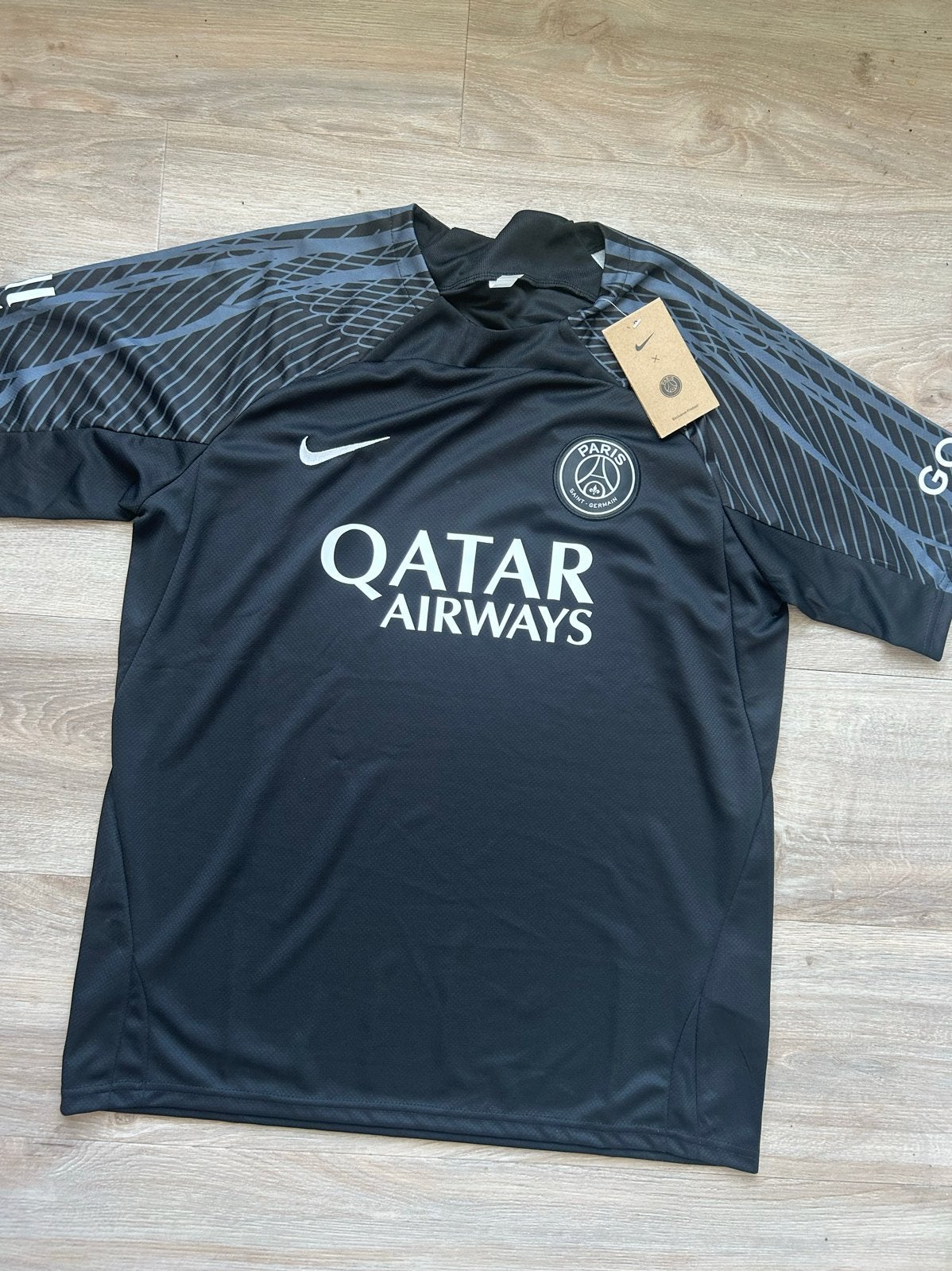 PSG shirt maat L nieuw met prijskaartje, Maat 52/54 (L), Verzenden, Zwart, Nieuw