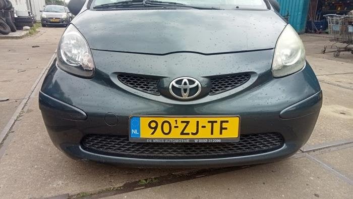 Voorbumper van een Toyota Aygo (1E0), Gebruikt, -, -, Ophalen of Verzenden