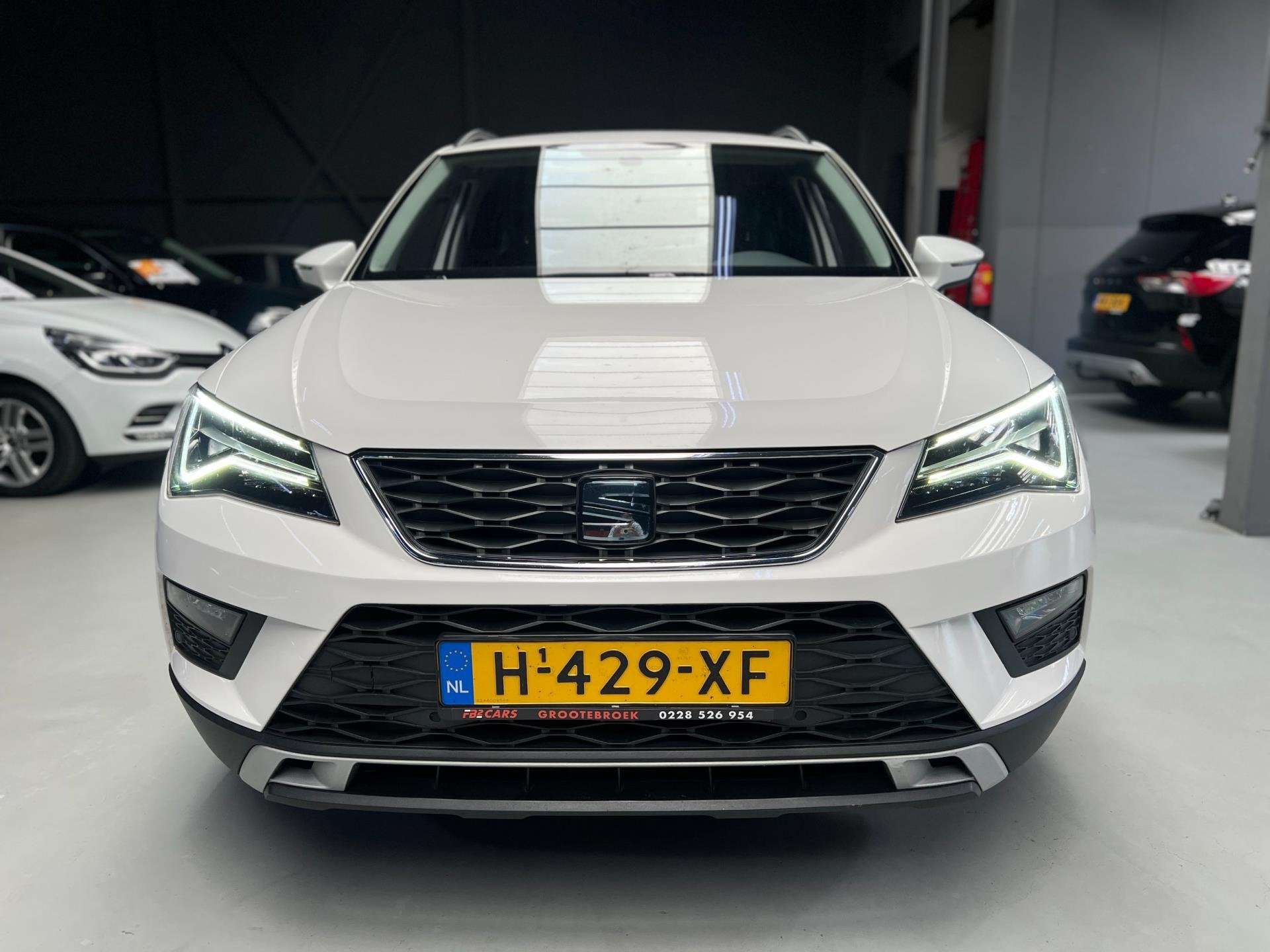 Seat Ateca 1.5 TSI Style Business Intense I Navi I Camera I, Auto's, Stof, 4 cilinders, 150 pk, Ateca