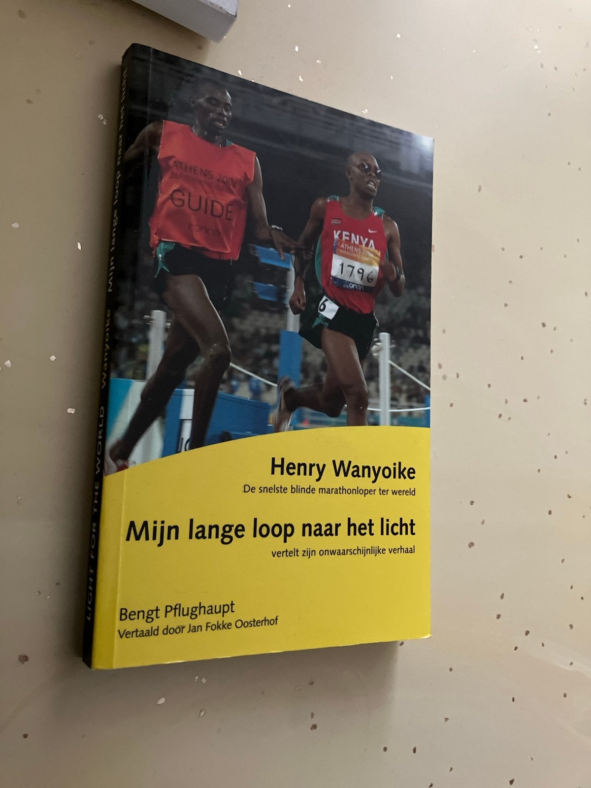 Mijn lange loop naar het licht - Henry Wanyoike, Ophalen of Verzenden, Zo goed als nieuw, Lopen en Fietsen