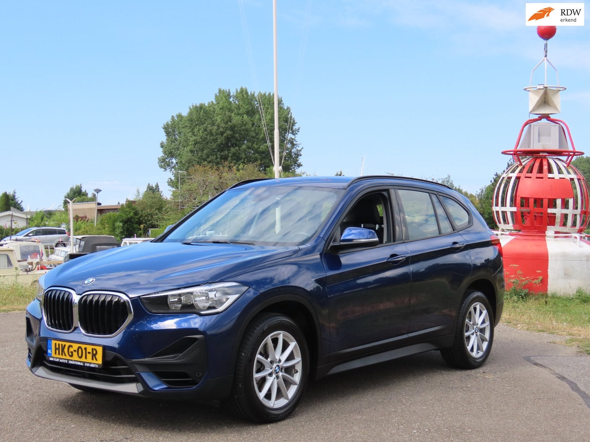 BMW X1 SDrive18i High Executive *Leer *Navi *Camera, Auto's, 15 km/l, Gebruikt, Blauw, Leder