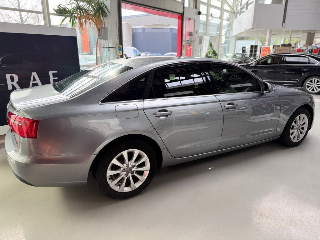 Audi A6 Limousine 3.0 TDI quattro Pro Line Plus, Auto's, Audi, Automaat, Gebruikt, Zwart, 320 pk