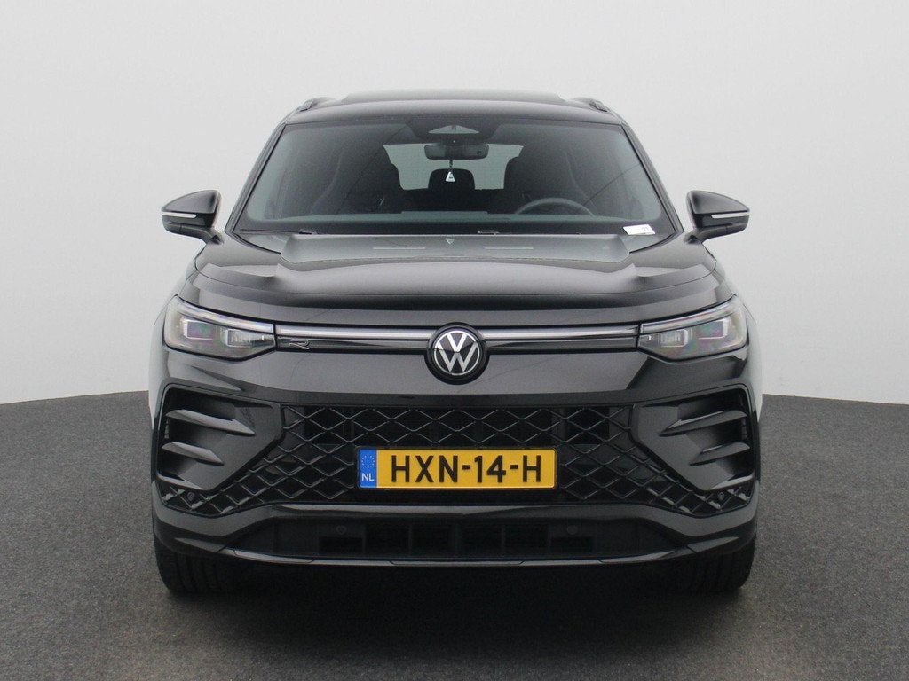 Volkswagen Tayron 1.5 eHybrid R-Line Edition 204 PK| Origine, Auto's, Volkswagen, 12 maanden, Stof, 4 cilinders, 150 min